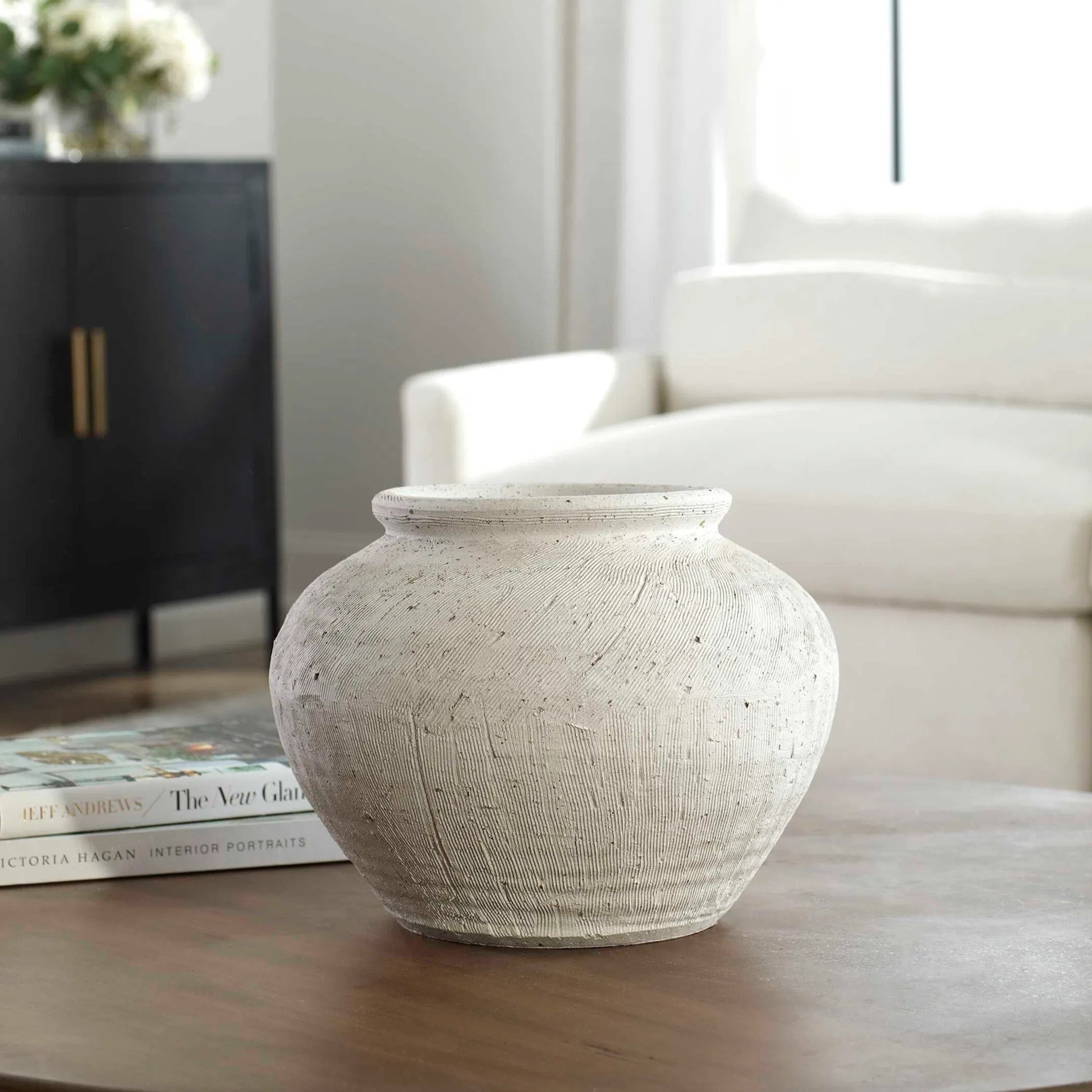 Floreana Round Vase by Uttermost in white. Made from ceramic in a modern style.