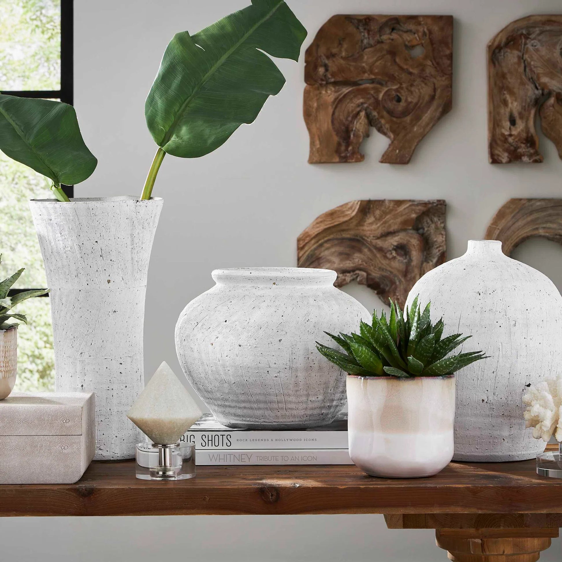 Floreana Round Vase by Uttermost in white. Made from ceramic in a modern style.