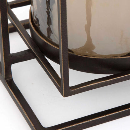 Wenman Candleholder by Uttermost in dark bronze. Made from glass, iron in a unique style.