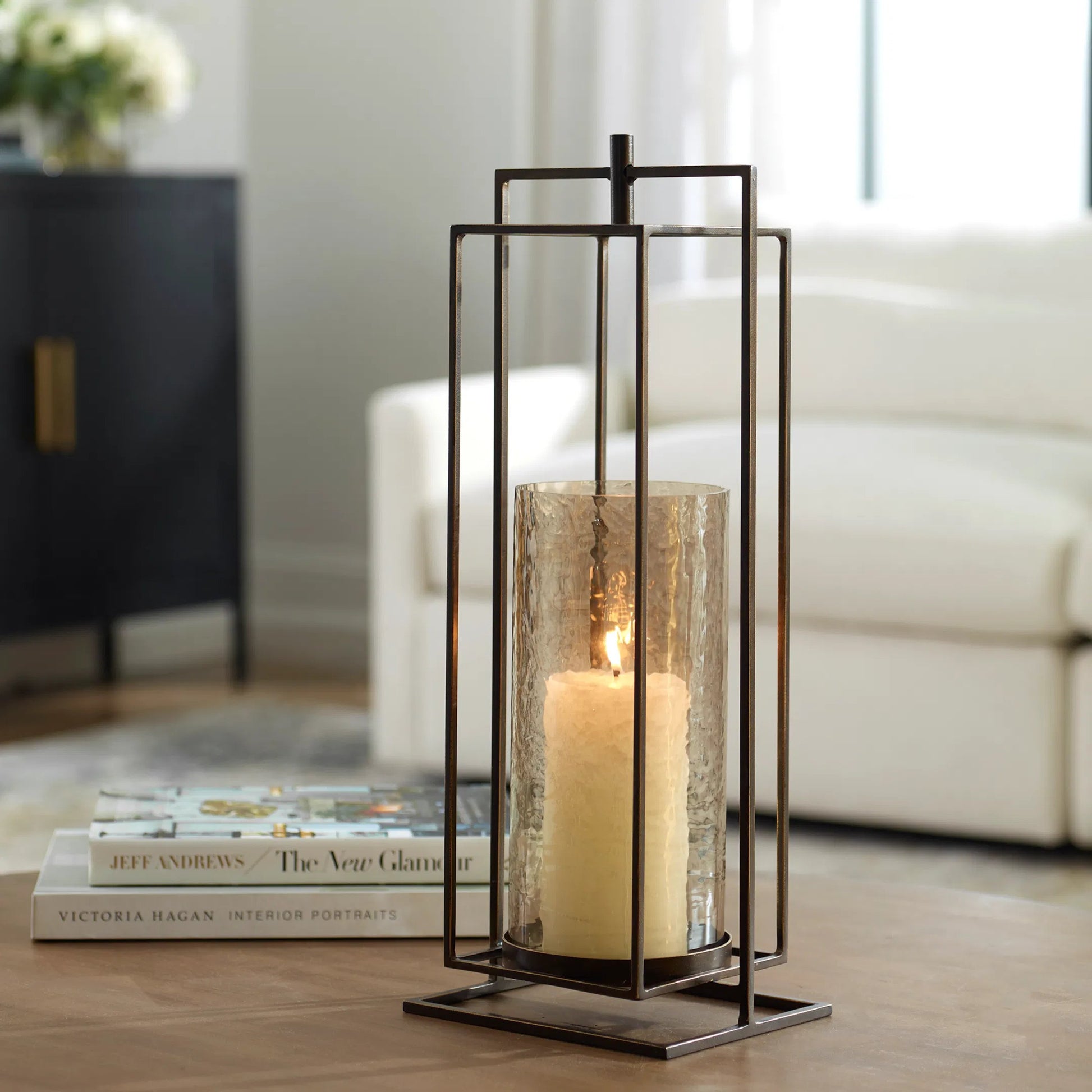 Wenman Candleholder by Uttermost in dark bronze. Made from glass, iron in a unique style.