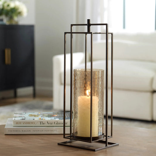 Wenman Candleholder by Uttermost in dark bronze. Made from glass, iron in a unique style.