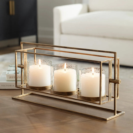 Wenman Triple Candleholder by Uttermost in gold. Made from glass, iron in a unique style.