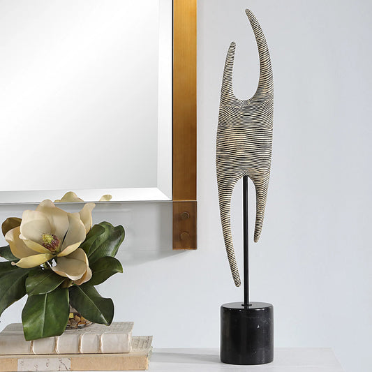 Pochette Ribbed Sculpture by Uttermost in iron. Made from resin, steel, gx black marble in a unique style.