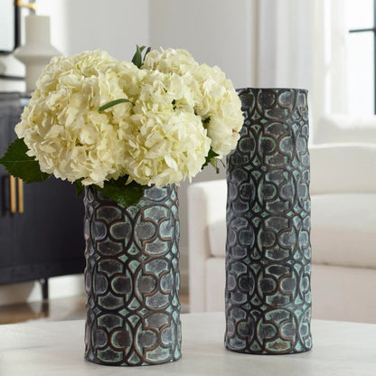 Baltra Patina Vases by Uttermost in bronze. Made from ceramic in a rustic style.