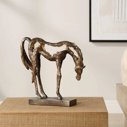 Openly Grazing Horse Sculpture by Uttermost in antique bronze. Made from polyresin in a unique style.