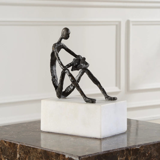 Sit Back, Relax and Read Sculpture by Uttermost in dark brown. Made from mable, iron in a unique style.