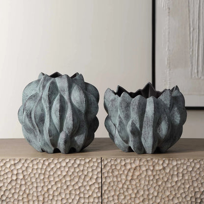 Verdant Vases by Uttermost in bronze. Made from ceramic in a eclectic & global style.