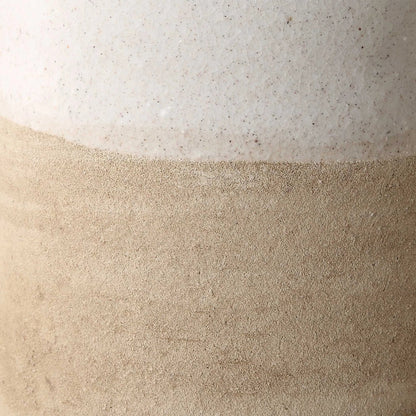 Sands Ceramic Vases by Uttermost in white. Made from ceramic in a unique style.