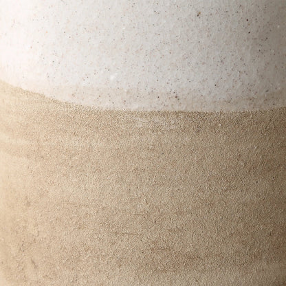 Sands Ceramic Vases by Uttermost in white. Made from ceramic in a unique style.