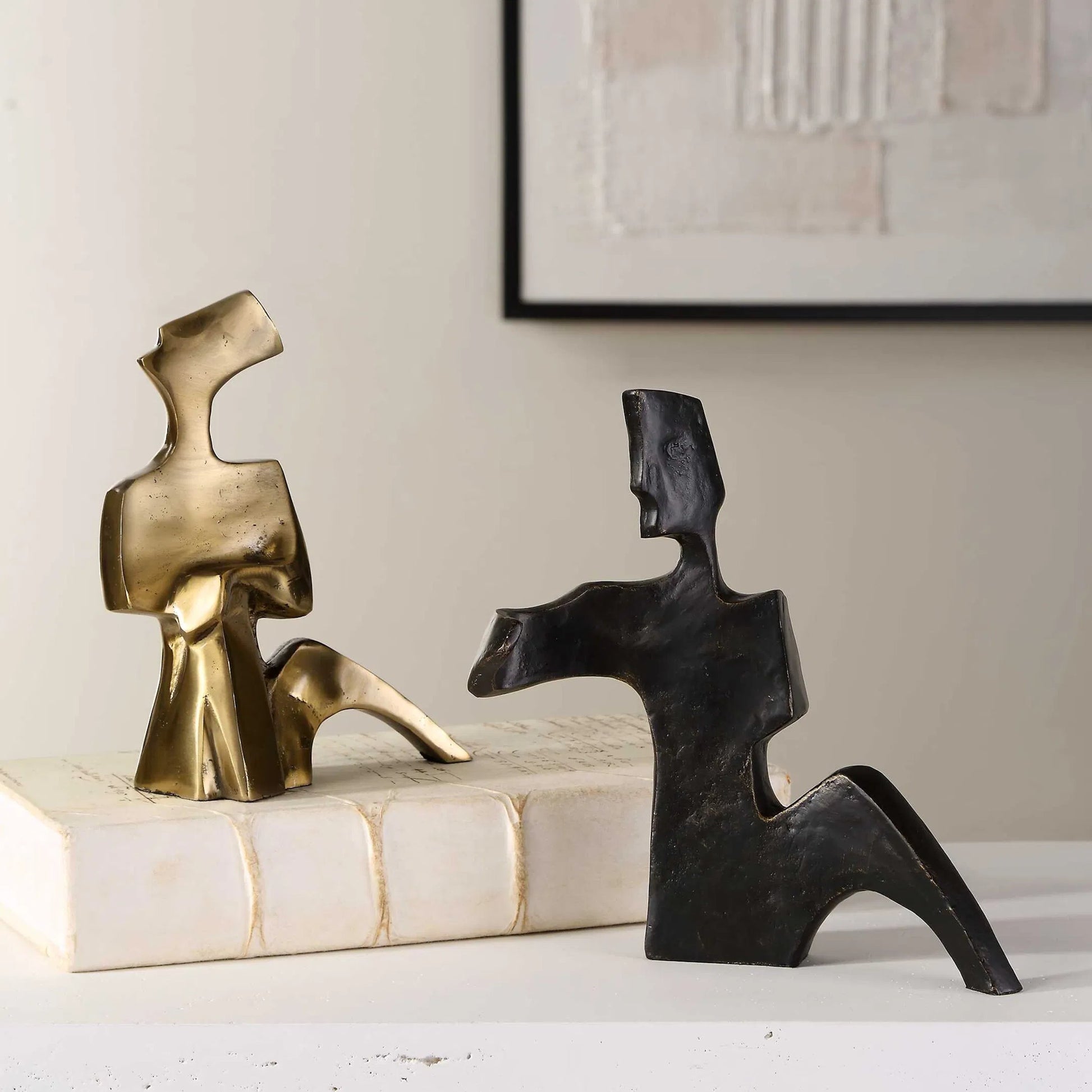 Affection Sculpture by Uttermost in gold. Made from cast iron in a eclectic & global style.