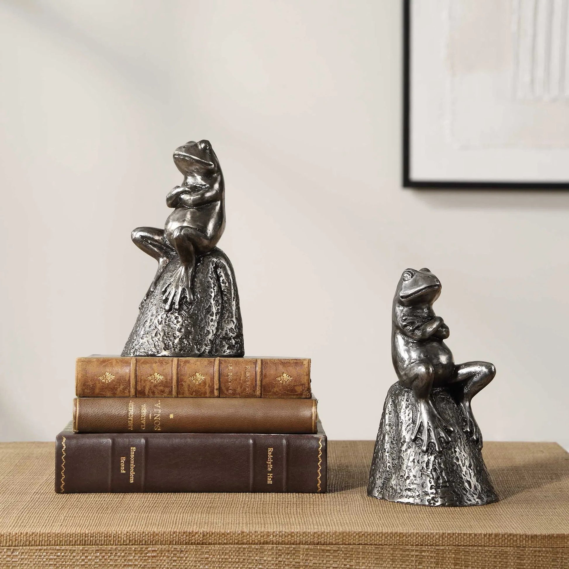 Daydreaming Frogs Bookends by Uttermost in silver. Made from cast iron in a cottage & farmhouse style.