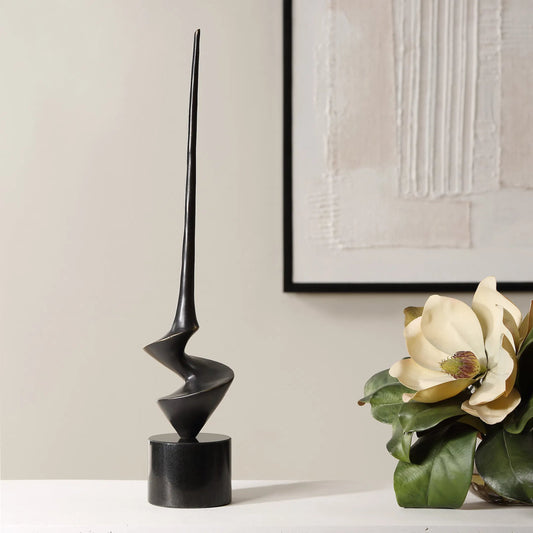 All Twisted Sculpture by Uttermost in gold. Made from cast iron, marble in a unique style.