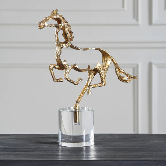 Gallop Sculpture by Uttermost in gold. Made from crystal, zinc alloy in a unique style.