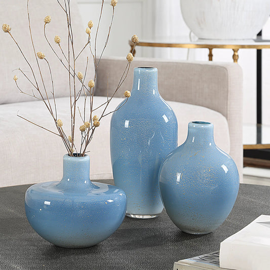 Celestial Frost Vases by Uttermost in blue. Made from glass in a unique style.