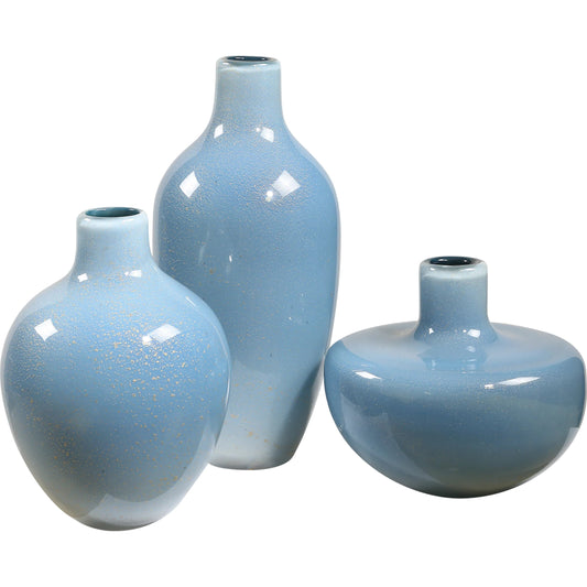 Celestial Frost Vases by Uttermost in blue. Made from glass in a unique style.