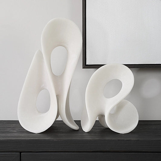 Silent Wave Sculptures by Uttermost in white. Made from polyresin in a unique style.