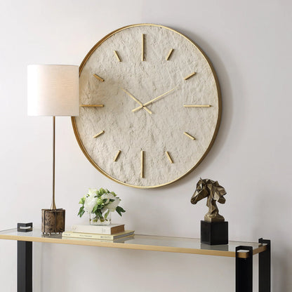 Serenity Wall Clock by Uttermost in gold. Made from iron, stone sheet, mdf in a modern style.