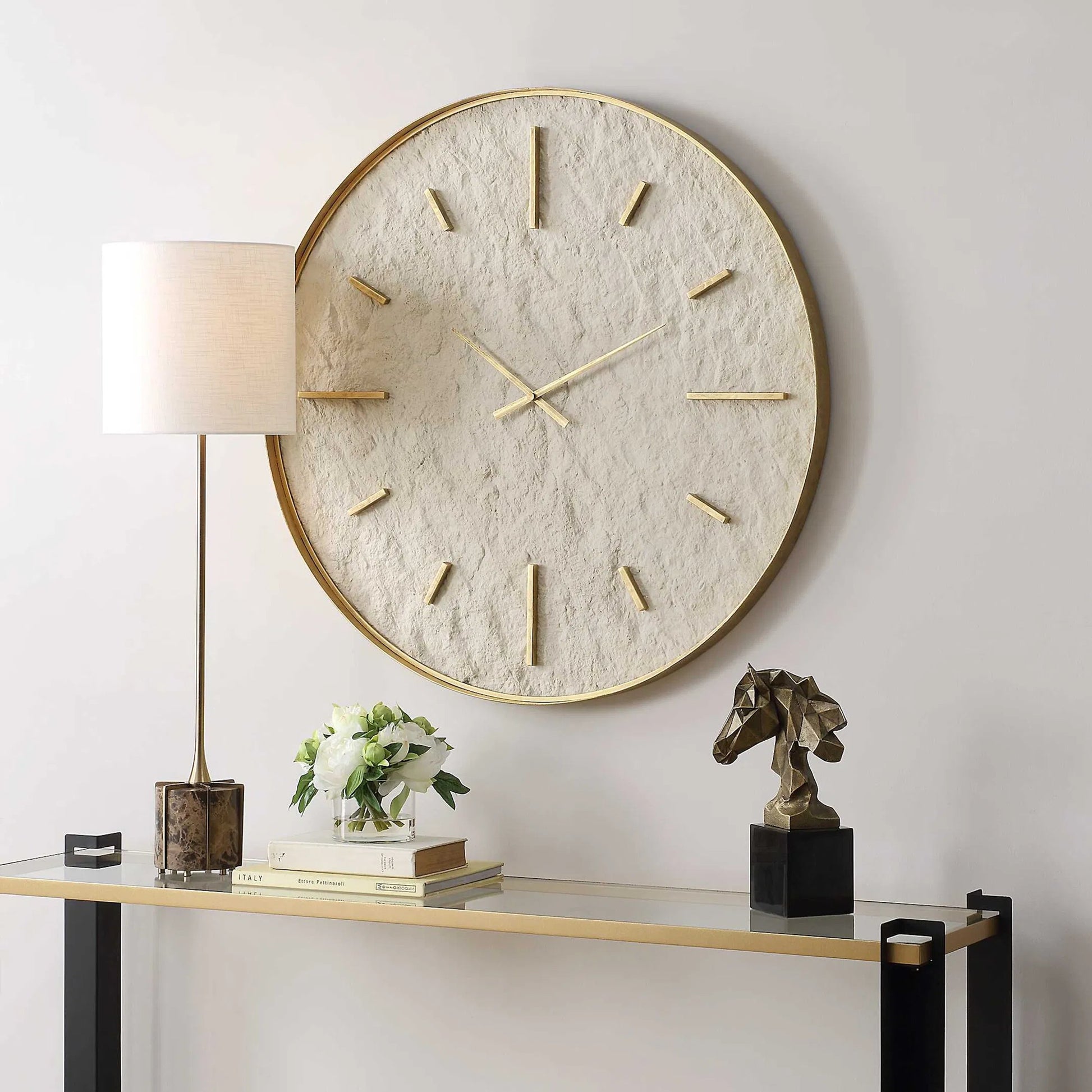 Serenity Wall Clock by Uttermost in gold. Made from iron, stone sheet, mdf in a modern style.