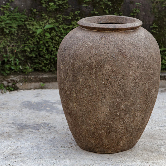 Rustic Earth Terracotta Planter by Uttermost in brown. Made from terracotta in a unique style.