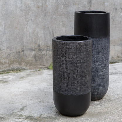 Woven Shadow Vases by Uttermost in black. Made from terracota, weave sisal fibers in a transitional style.