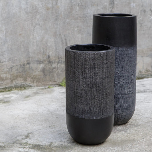 Woven Shadow Vases by Uttermost in black. Made from terracota, weave sisal fibers in a unique style.
