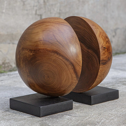 Teak and Noir Bookends by Uttermost in teak. Made from teak wood in a unique style.