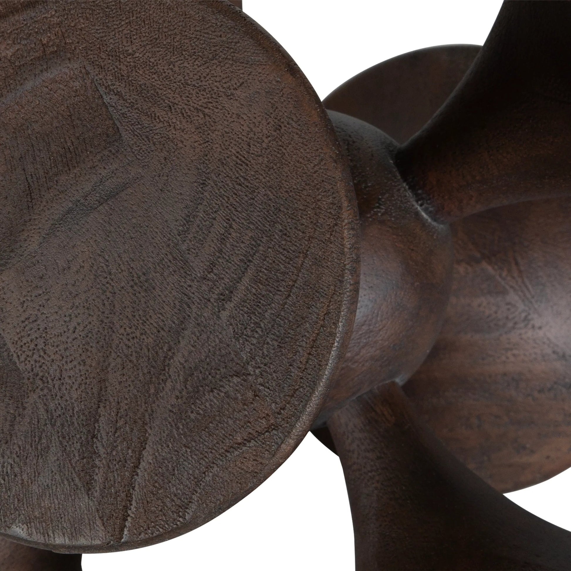 Balanced Harmony Sculptures by Uttermost in dark. Made from suar wood in a traditional style.