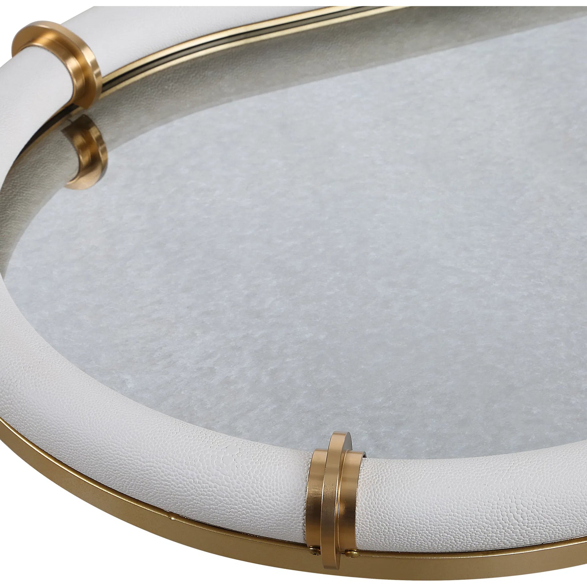 Cyprus Leather Oval Tray by Uttermost in brass. Made from steel, glass, shagreen, pu leather, aluminum in a transitional style.