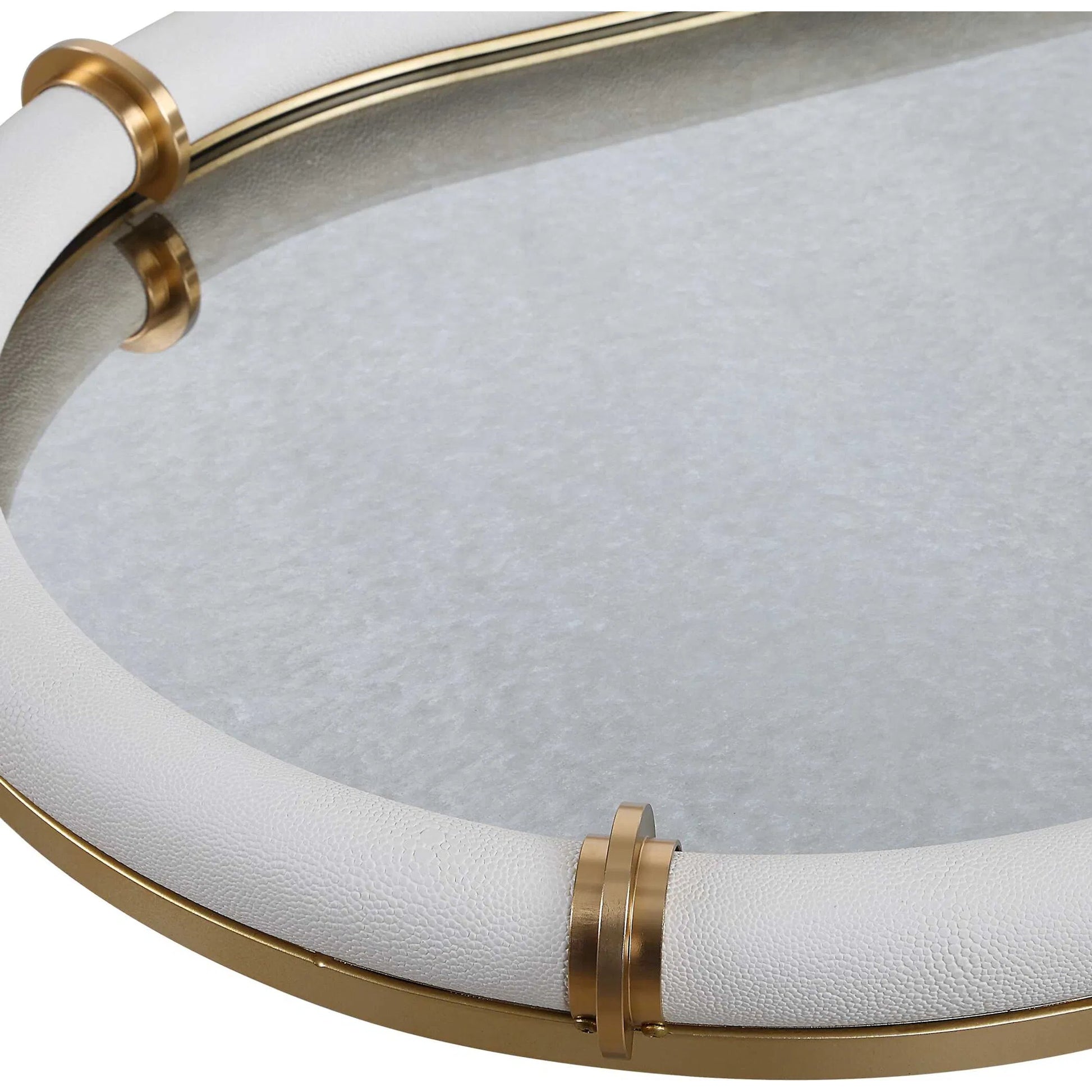 Cyprus Leather Oval Tray by Uttermost in brass. Made from steel, glass, shagreen, pu leather, aluminum in a transitional style.
