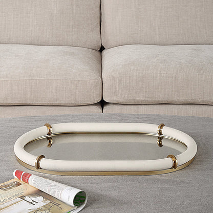 Cyprus Leather Oval Tray by Uttermost in brass. Made from steel, glass, shagreen, pu leather, aluminum in a transitional style.