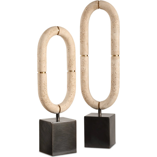 Oval Sculptures Fusion (Set of 2) by Uttermost in dark bronze. Made from steel, faxu travertine resin in a transitional style.