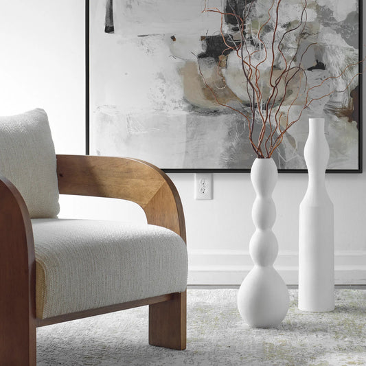 Forma Ceramic Vases (Set of 2) by Uttermost in white. Made from earthenware in a unique style.