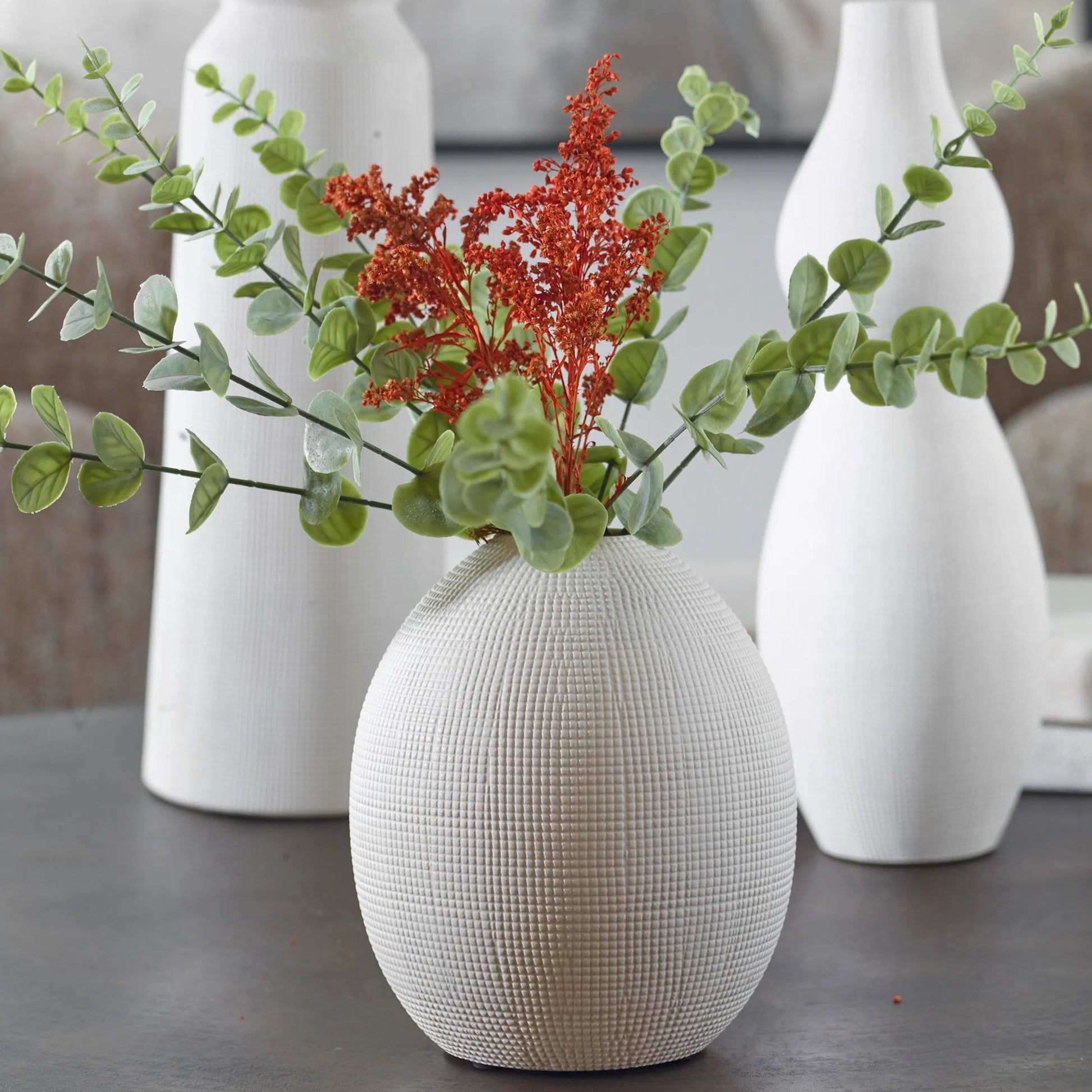 Forma Ceramic Vases (Set of 3) by Uttermost in white. Made from earthenware in a transitional style.