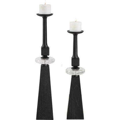 Ebon Glow Floor Candleholders (Set of 2) by Uttermost in black. Made from wood, crystal, metal in a modern style.