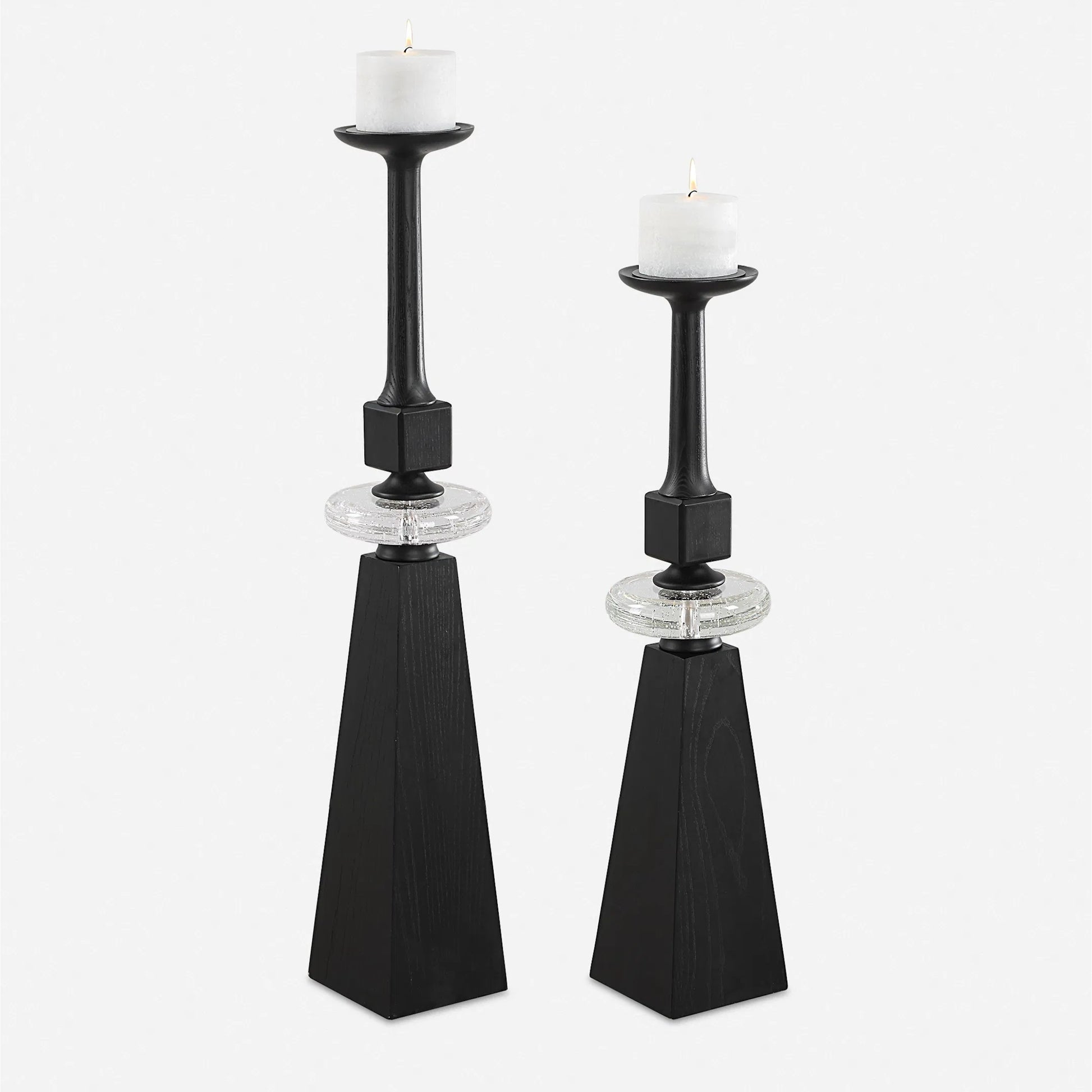 Ebon Glow Floor Candleholders (Set of 2) by Uttermost in black. Made from wood, crystal, metal in a modern style.