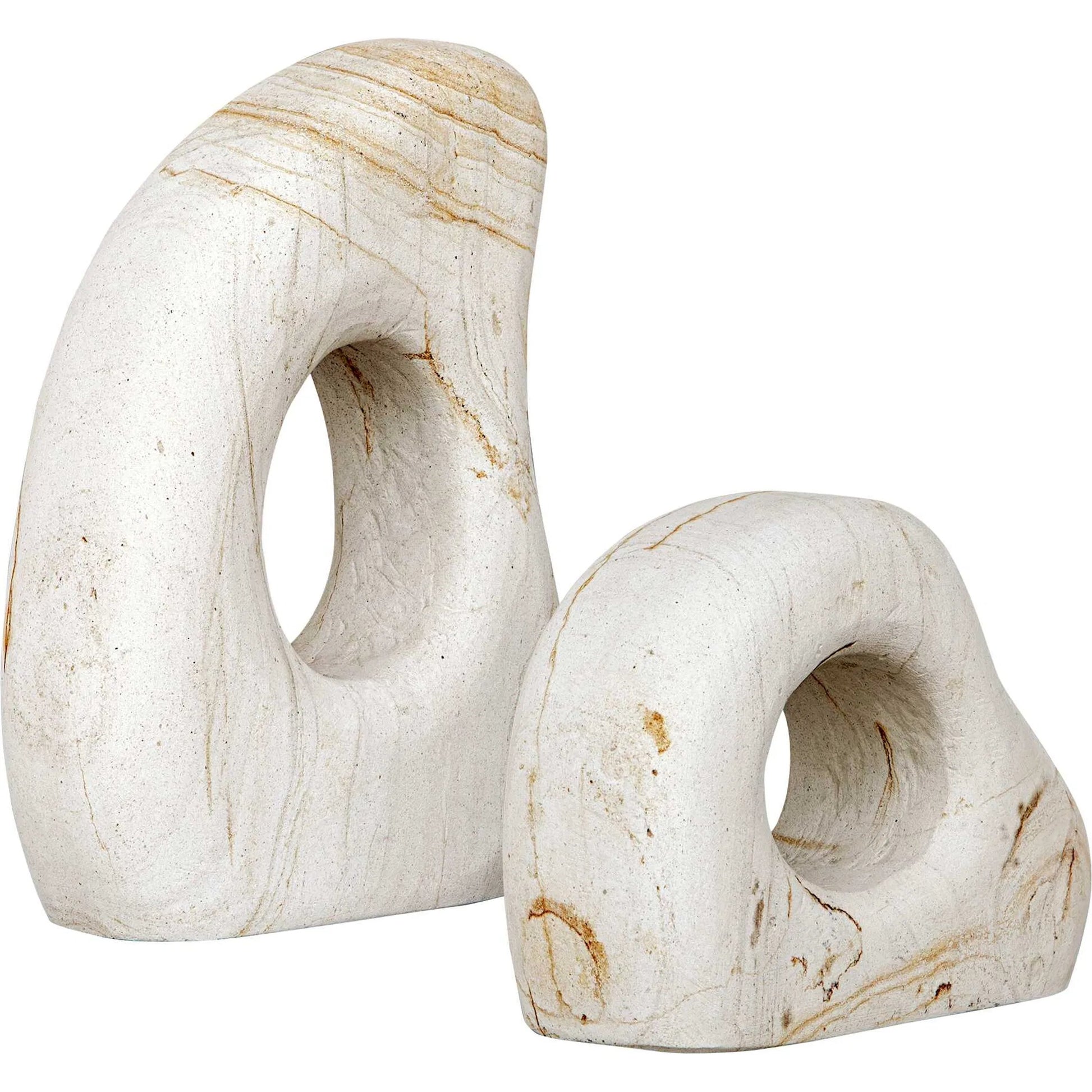 Flow Outdoor Sculptures by Uttermost in stone. Made from palimanan stone in a modern style.