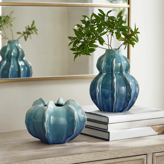 Ocean Wave Outdoor Glazed Vases by Uttermost in blue. Made from earthenware in a unique style.