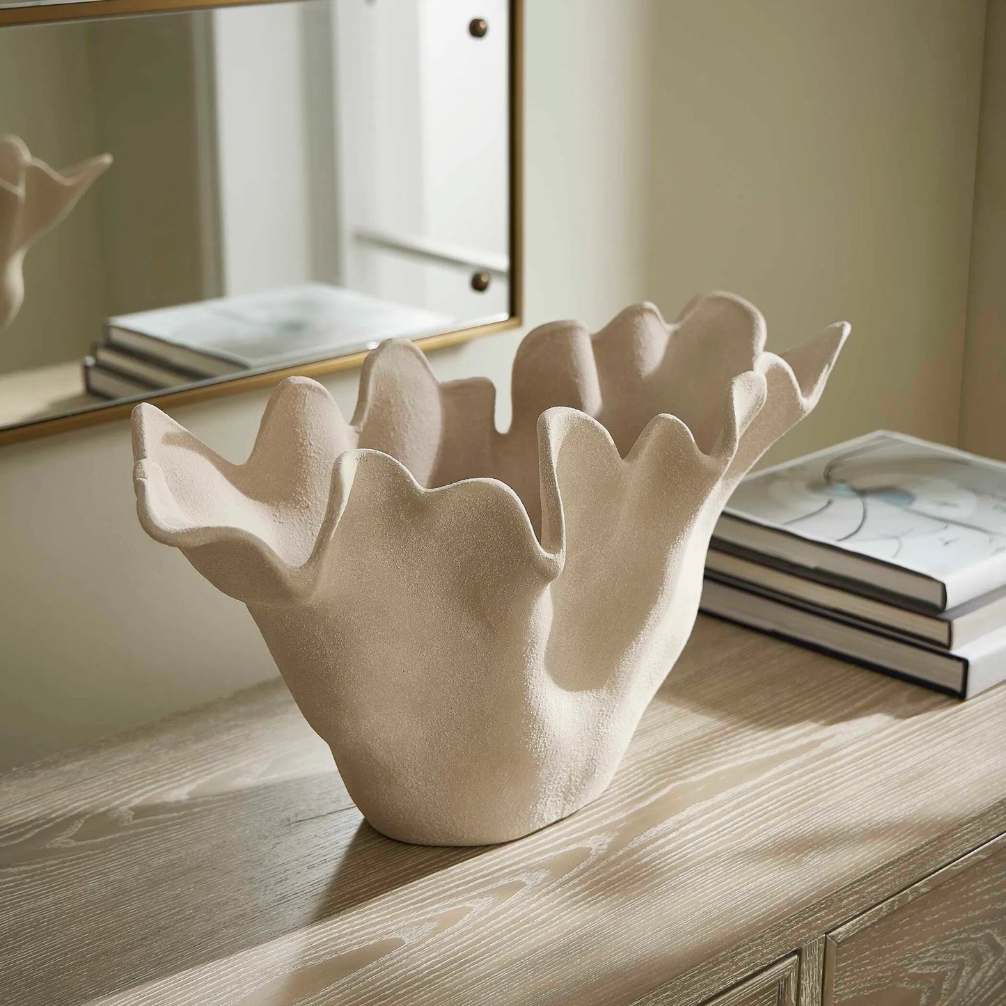 003 SI-2386632 | Lifestyle | Sand Dune Outdoor Ceramic Bowl by Uttermost in white. Made from earthenware in a transitional style.