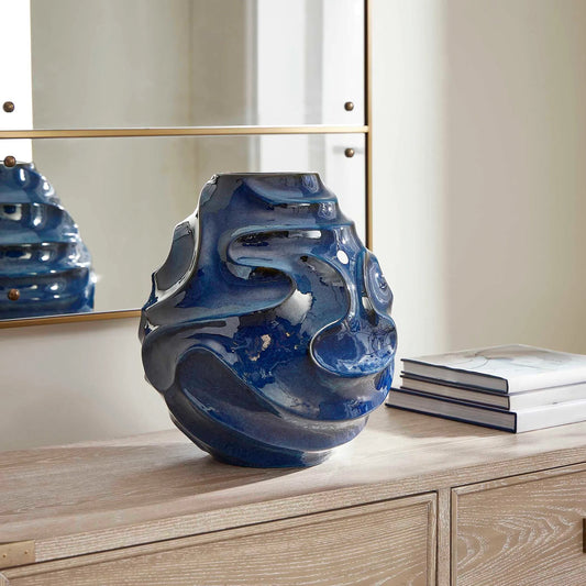 Helix Swirl Outdoor Vase by Uttermost in blue. Made from earthenware in a unique style.