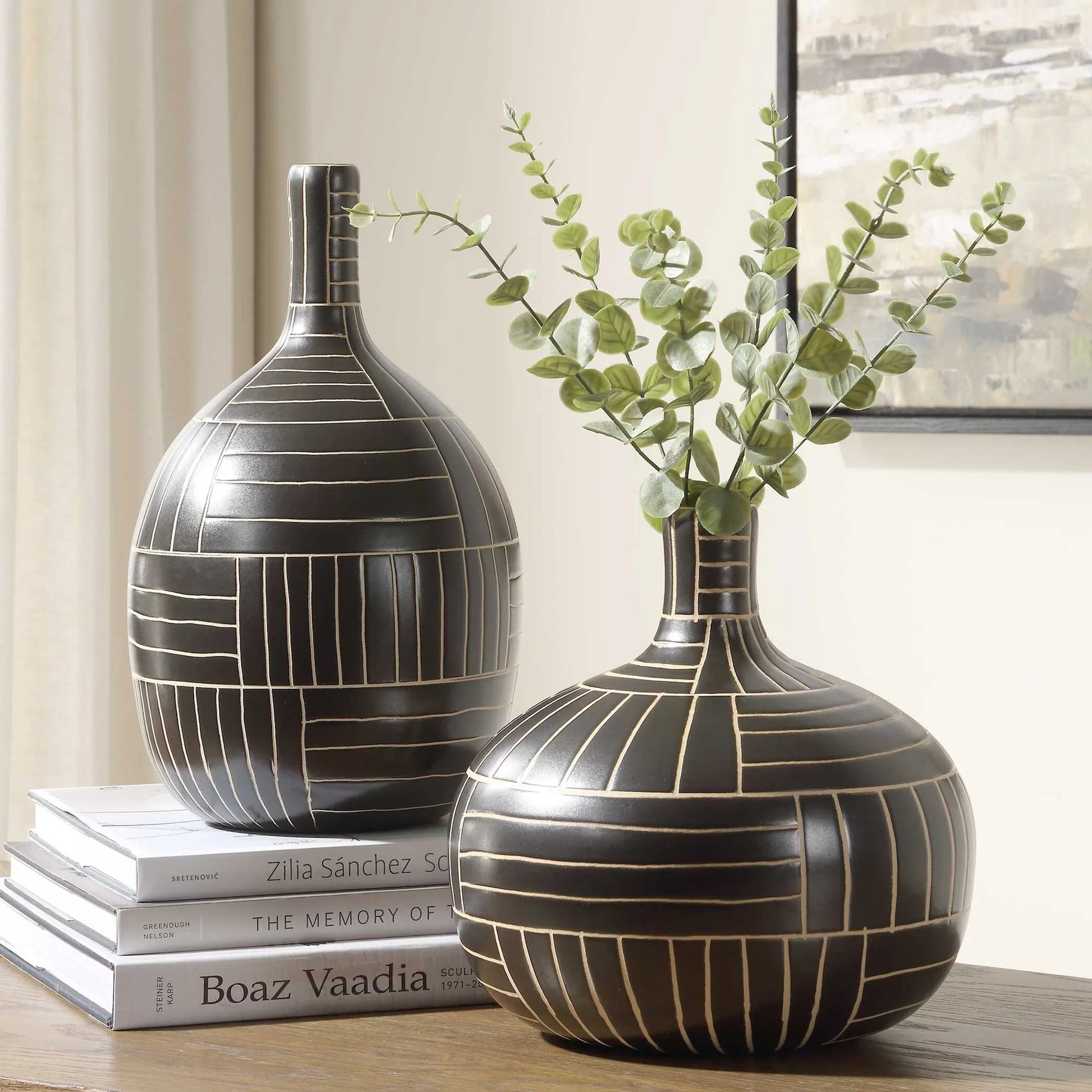 Graphite Stride Geometric Vases by Uttermost in black. Made from ceramic in a unique style.