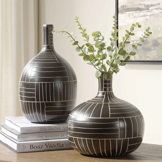 Graphite Stride Geometric Vases by Uttermost in black. Made from ceramic in a unique style.