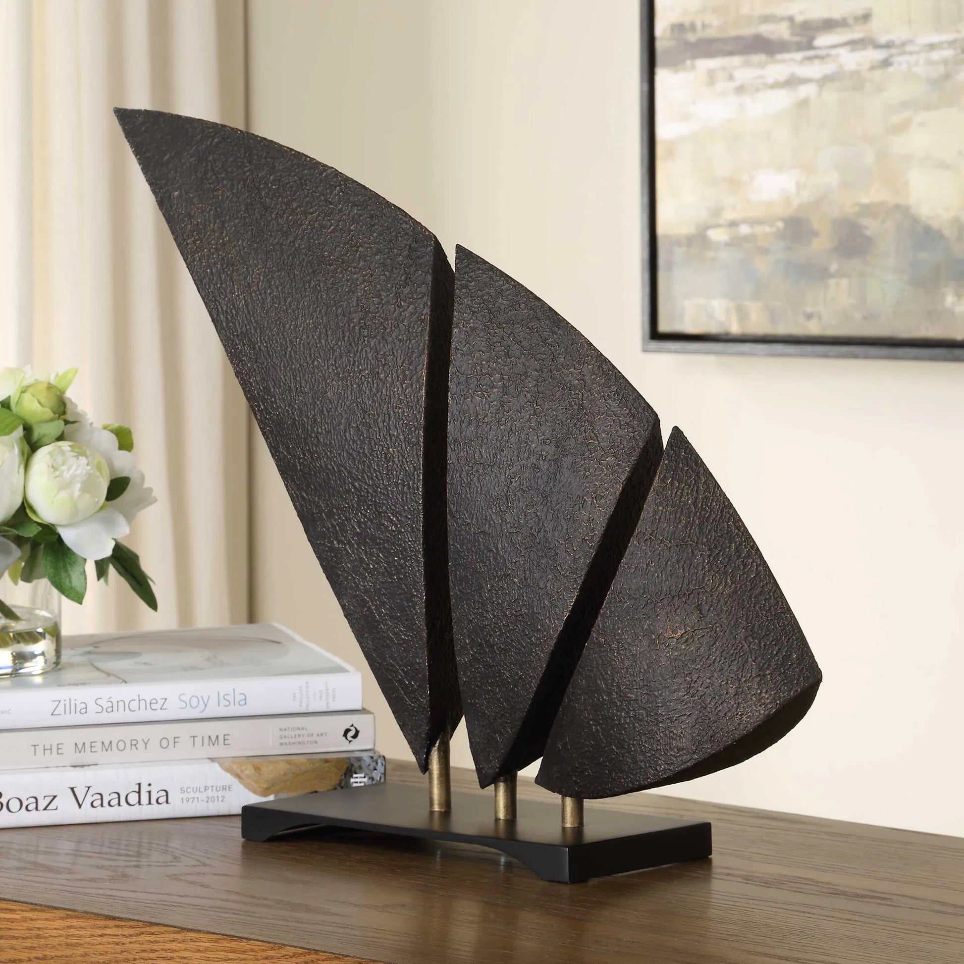 Wind Crest Sculpture by Uttermost in dark bronze. Made from iron in a modern style.
