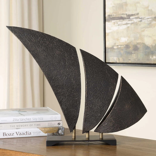 Wind Crest Sculpture by Uttermost in dark bronze. Made from iron in a unique style.