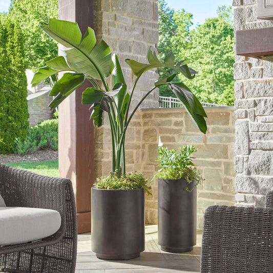 Volcan Matte Outdoor Planters by Uttermost in bronze. Made from iron in a unique style.