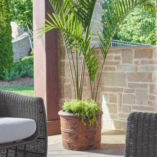 Weathered Relic Rustic Outdoor Planter by Uttermost in black. Made from grc in a unique style.