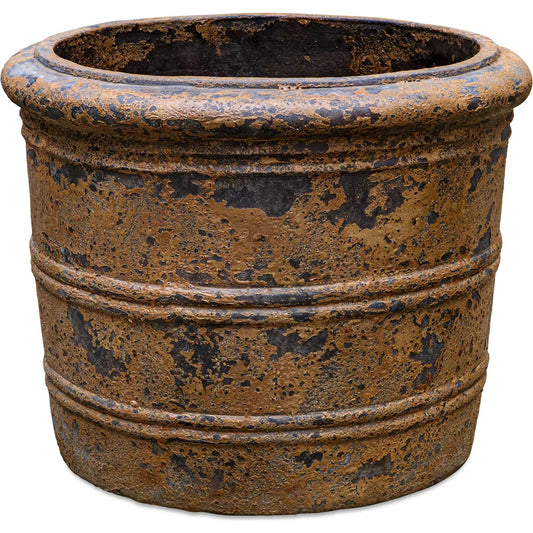 Weathered Relic Rustic Outdoor Planter by Uttermost in black. Made from grc in a unique style.