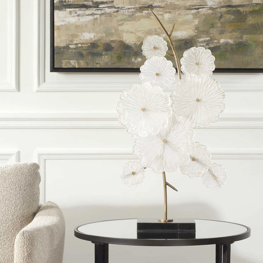 Glass Garden Table Sculpture by Uttermost in black. Made from glass, metal, marble in a transitional style.