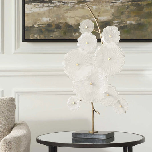 Glass Garden Table Sculpture by Uttermost in black. Made from glass, metal, marble in a unique style.