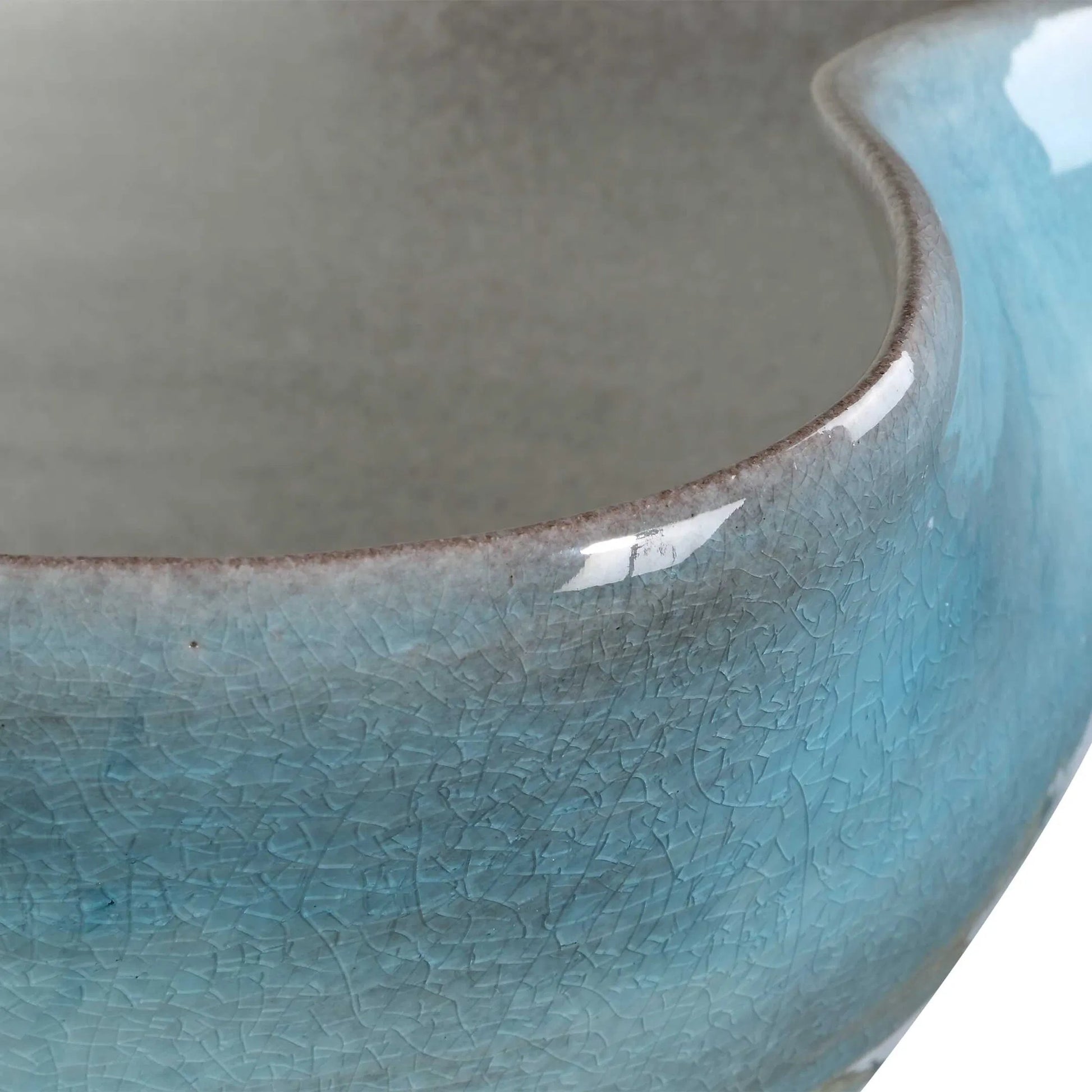 Crest Ceramic Bowl by Uttermost in blue, gray, white. Made from porcelain in a eclectic & global style.