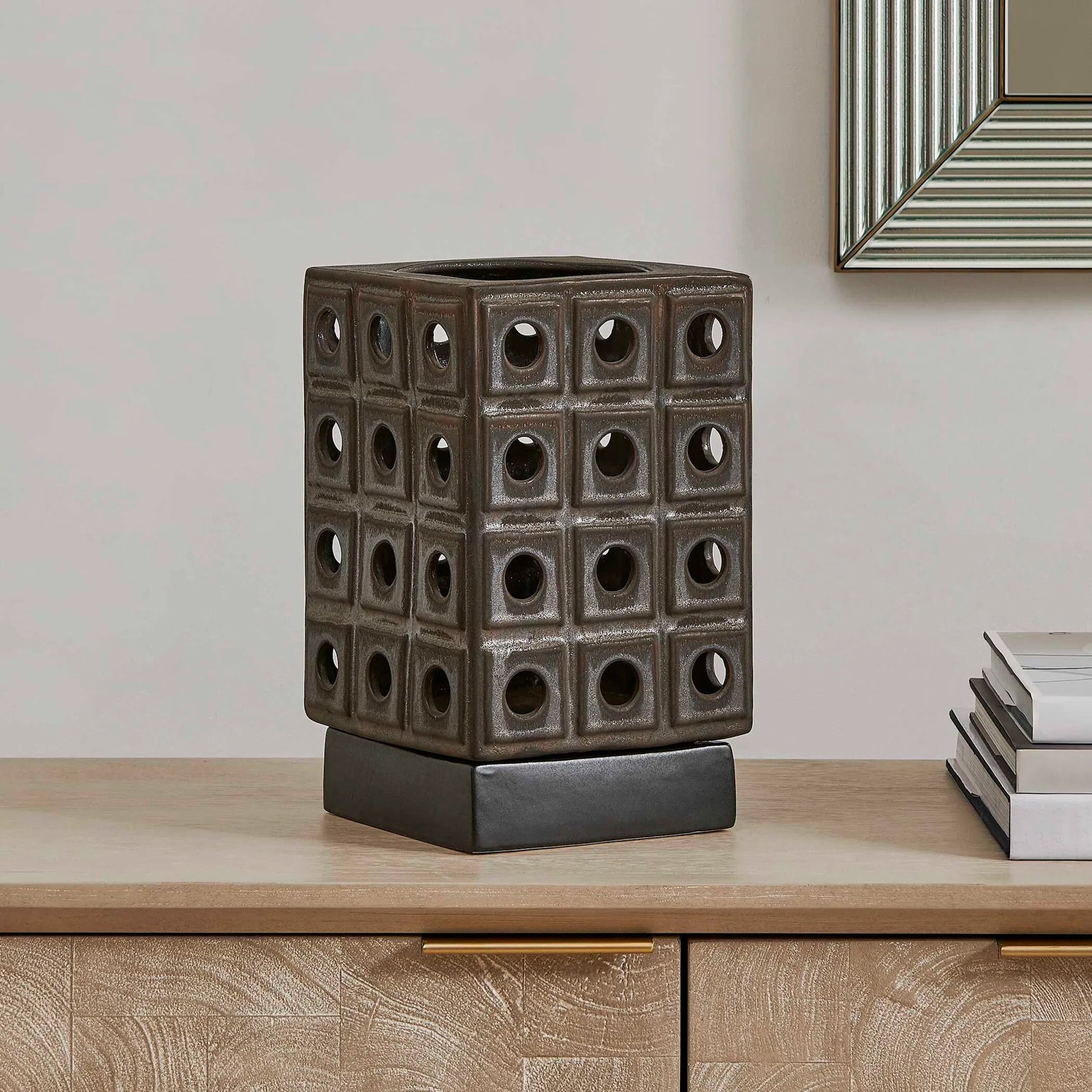 Lattice Indoor-Outdoor Lantern Candleholder by Uttermost in brown, gray and dark. Made from earthenware in a unique style.